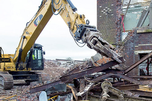 Cat equipment demoing building