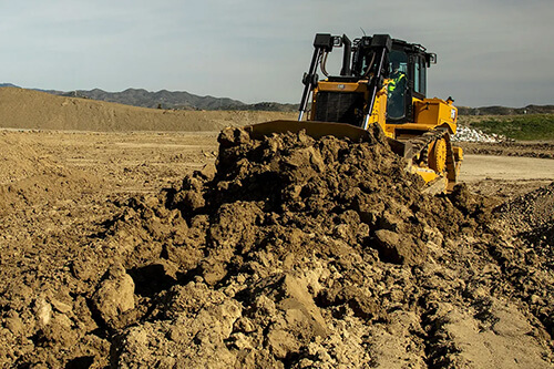 Cat equipment moving earth