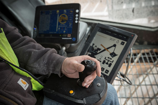 Caterpillar employees safely using equipment