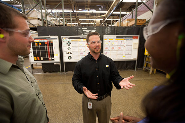 Caterpillar employees having safety meeting